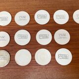 Set of 13 vintage ceramic coasters handmade by Lito Niarchos.