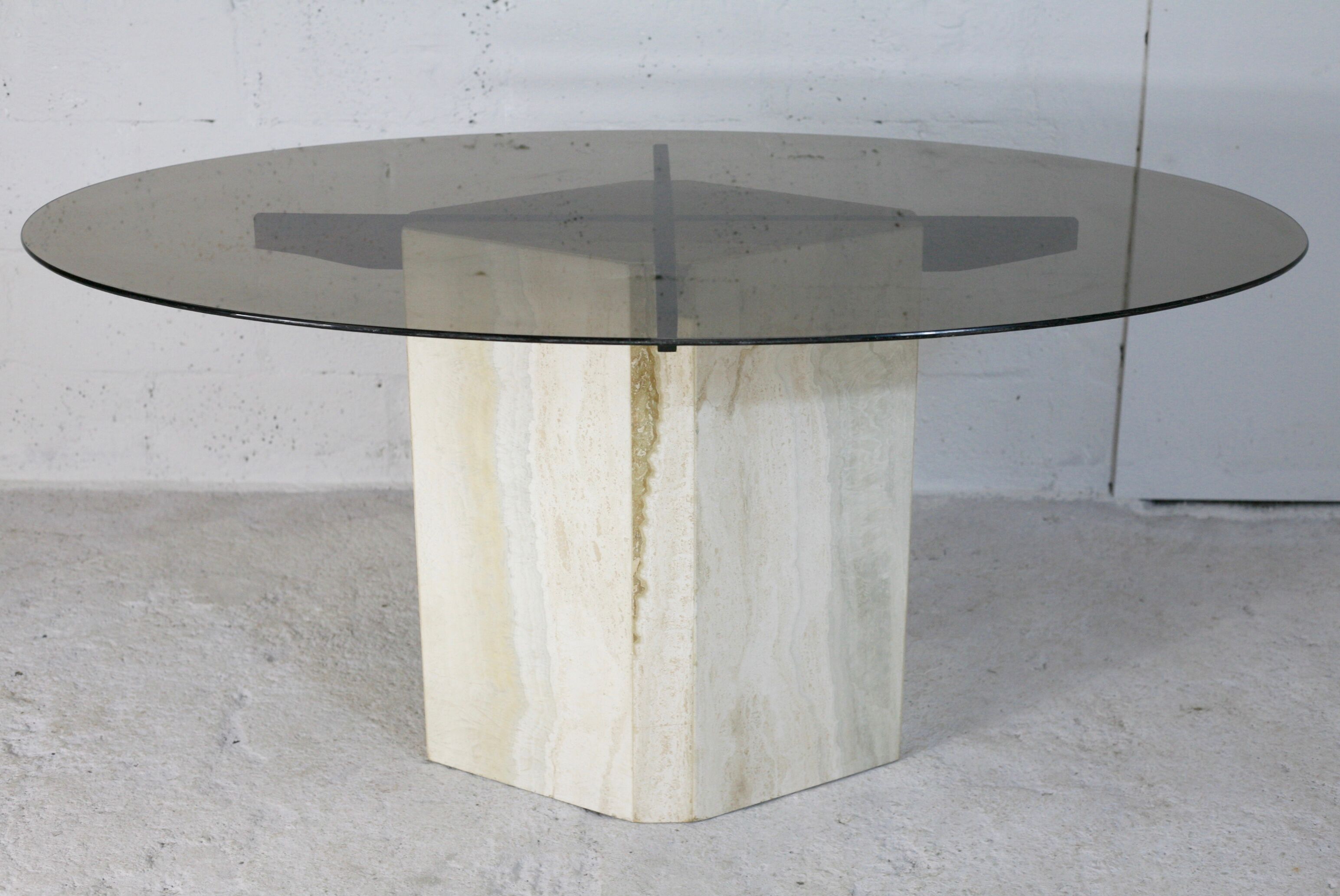 Living table, Comblanchian stone base and elliptical tray in smoked glass, Italy, 1970