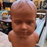 Child bust in terracotta