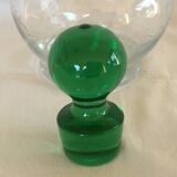 Glass wine carafe with green glass cap