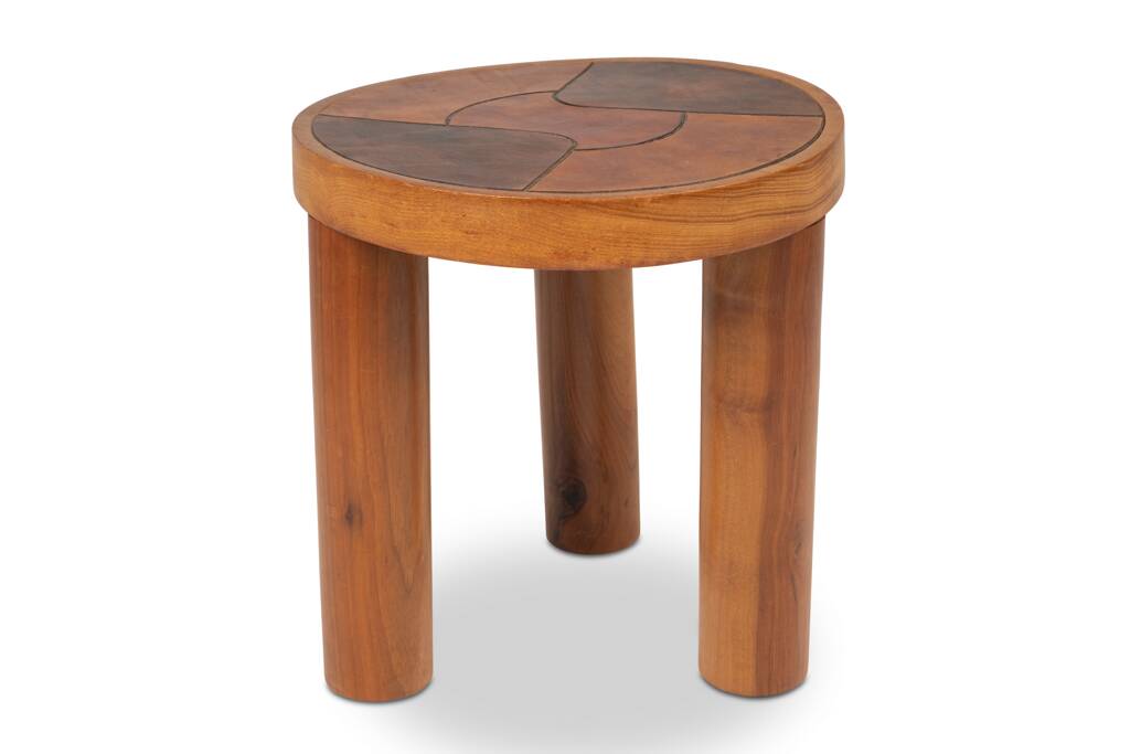 Stools and wall lights in cherry wood and leather. 1970s.