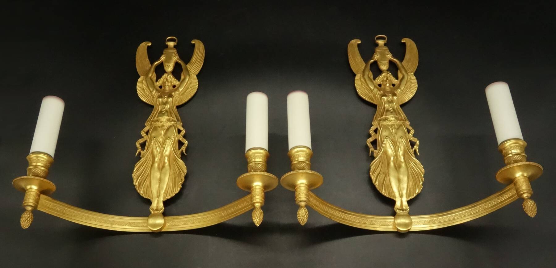Large pair of Empire style winged caryatid sconces - gilded bronze