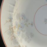 Set of four hollow Limoges porcelain plates signed Robert Haviland & Le Tanneur