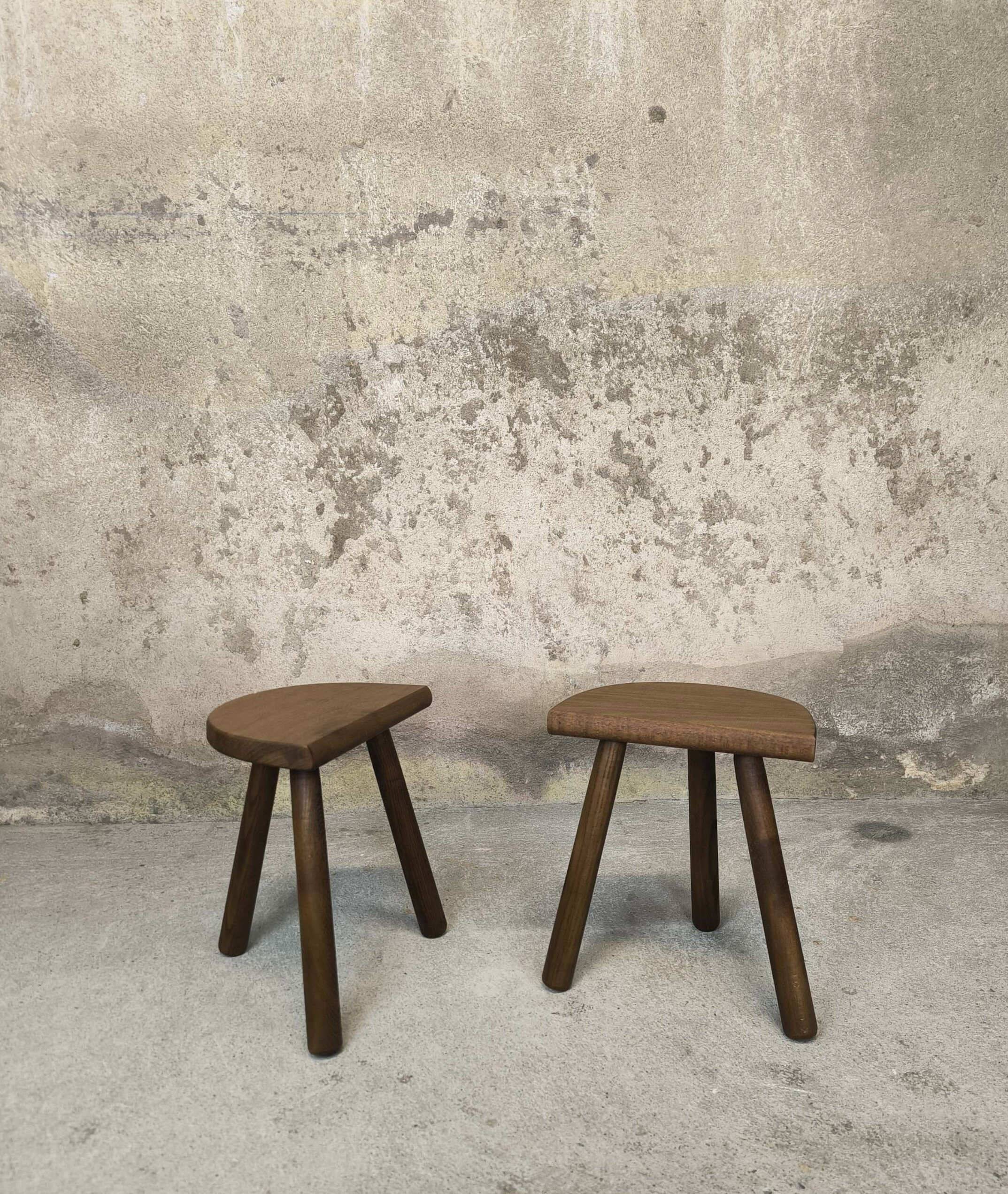 Vintage wooden tripod stool pair.