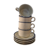 Four cups and their saucers