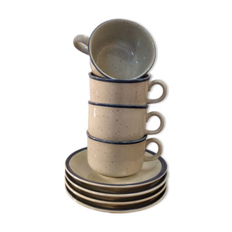 Four cups and their saucers