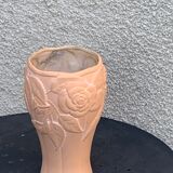 Terracotta vase with a vintage ceramic relief rose pattern