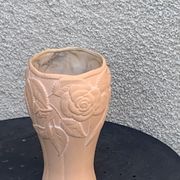 Terracotta vase with a vintage ceramic relief rose pattern