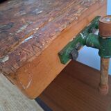 Vintage workbench with vices, antique workshop furniture.