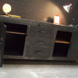 Former industrial workbench in metal