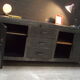 Former industrial workbench in metal