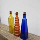 Trio of bottles 1970 color orange yellow and blue geometric shape