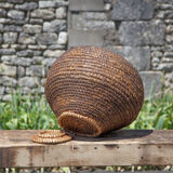 Old basket with lid, burgundy straw and bramble, woven basket, interior decoration