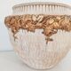 Terracotta pot cache golden flowers