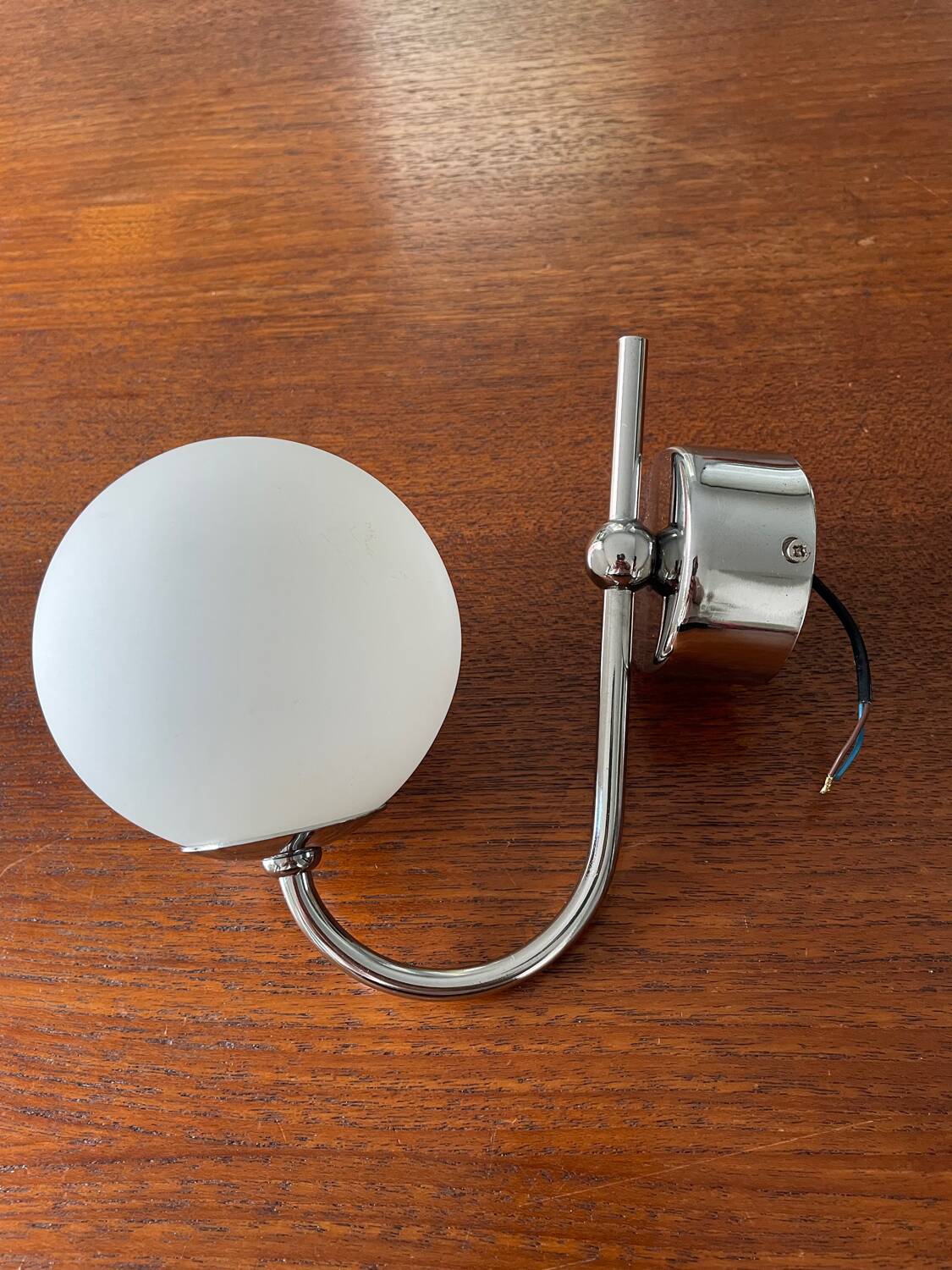 Chrome metal wall light and opaline ball