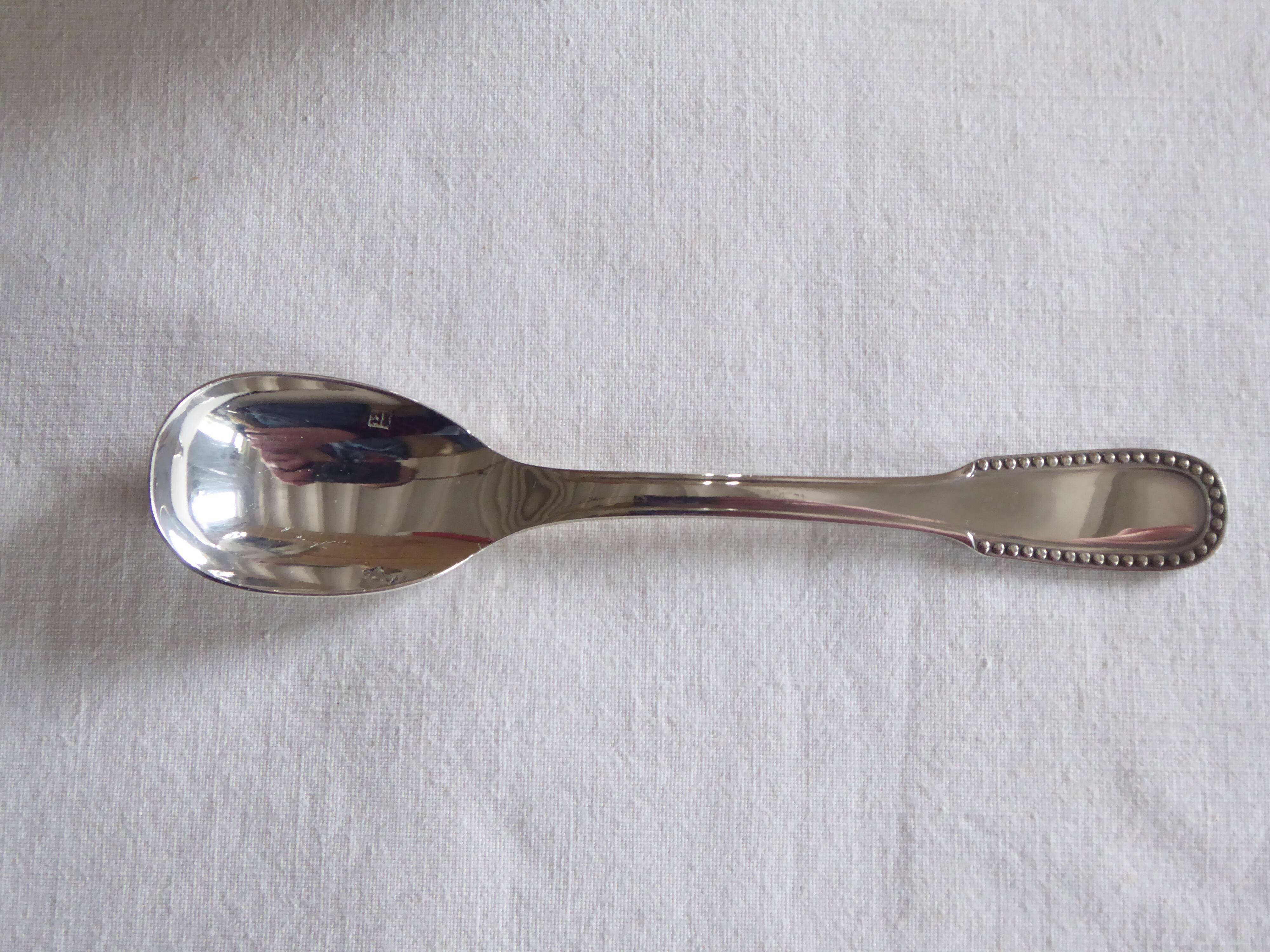 Cockerel + silver metal spoon