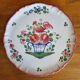 Antique pie dish in St Clément faience with a basket hen motif.