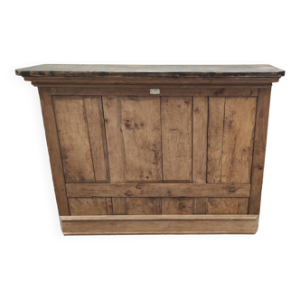 Old raw oak counter with black waxed top