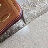 Mid-century Italian brown wooden chest of drawers, black glass top and brass handles.