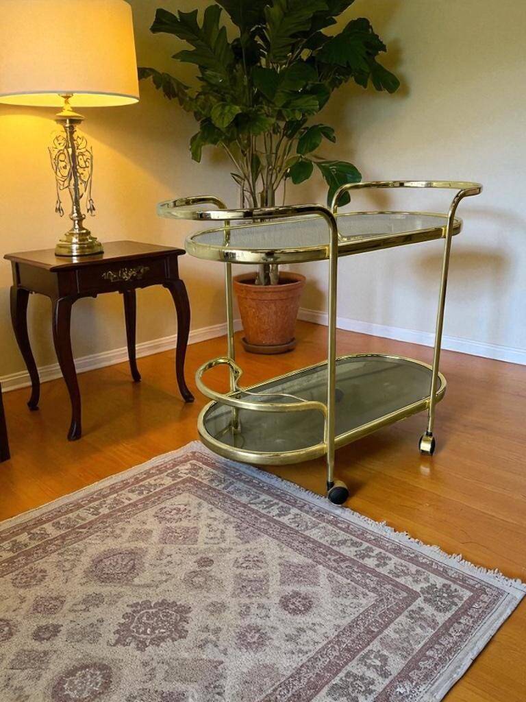 Vintage gold bar cart / side table with smoked glass