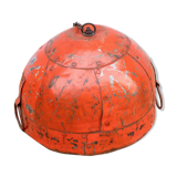 Metal hanging with its original red colour