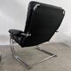 Old armchair and ottoman black leather tubular chrome bauhaus design from the 70s