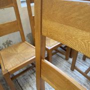 Set of 8 blond oak chairs with straw seats