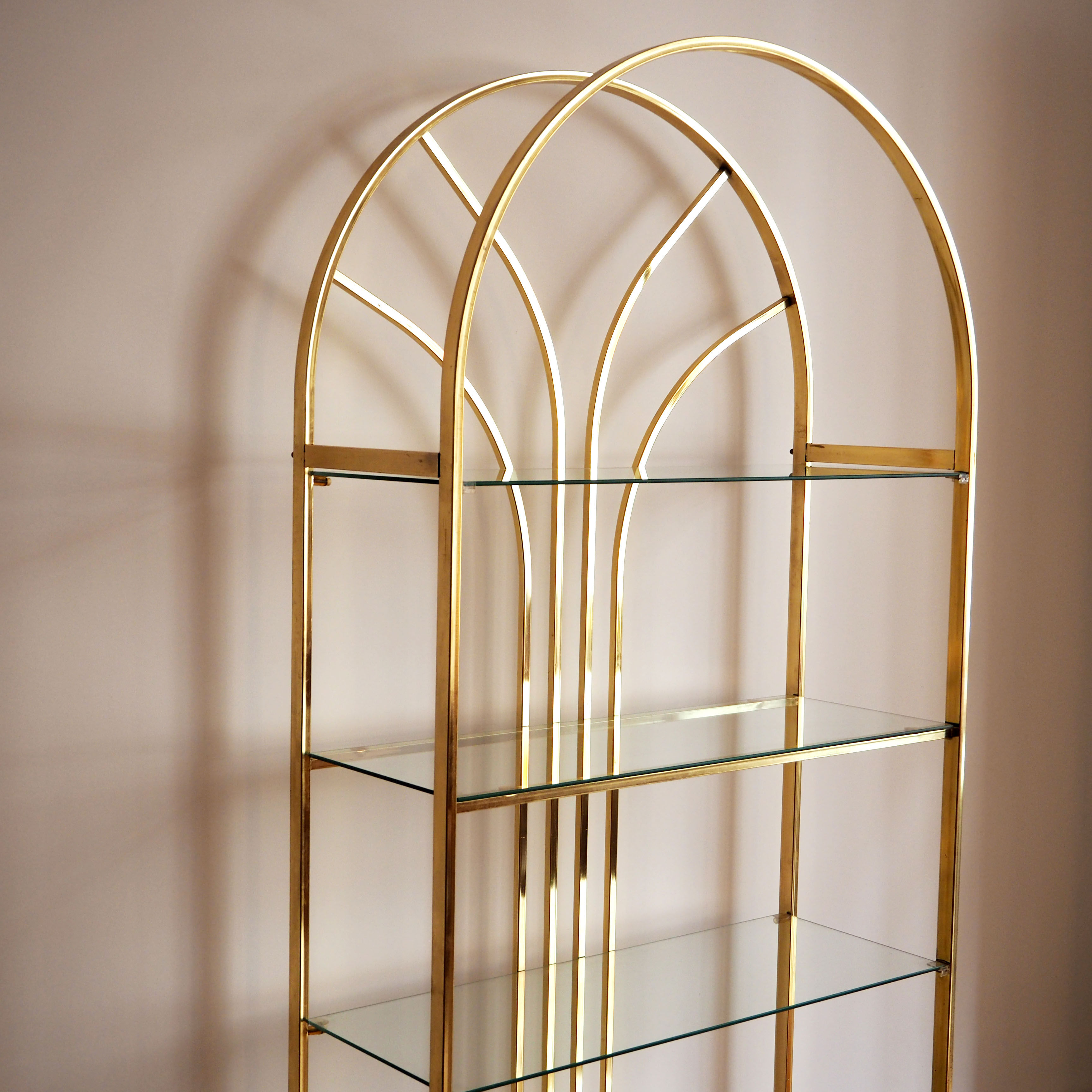 Gold glass and metal shelf