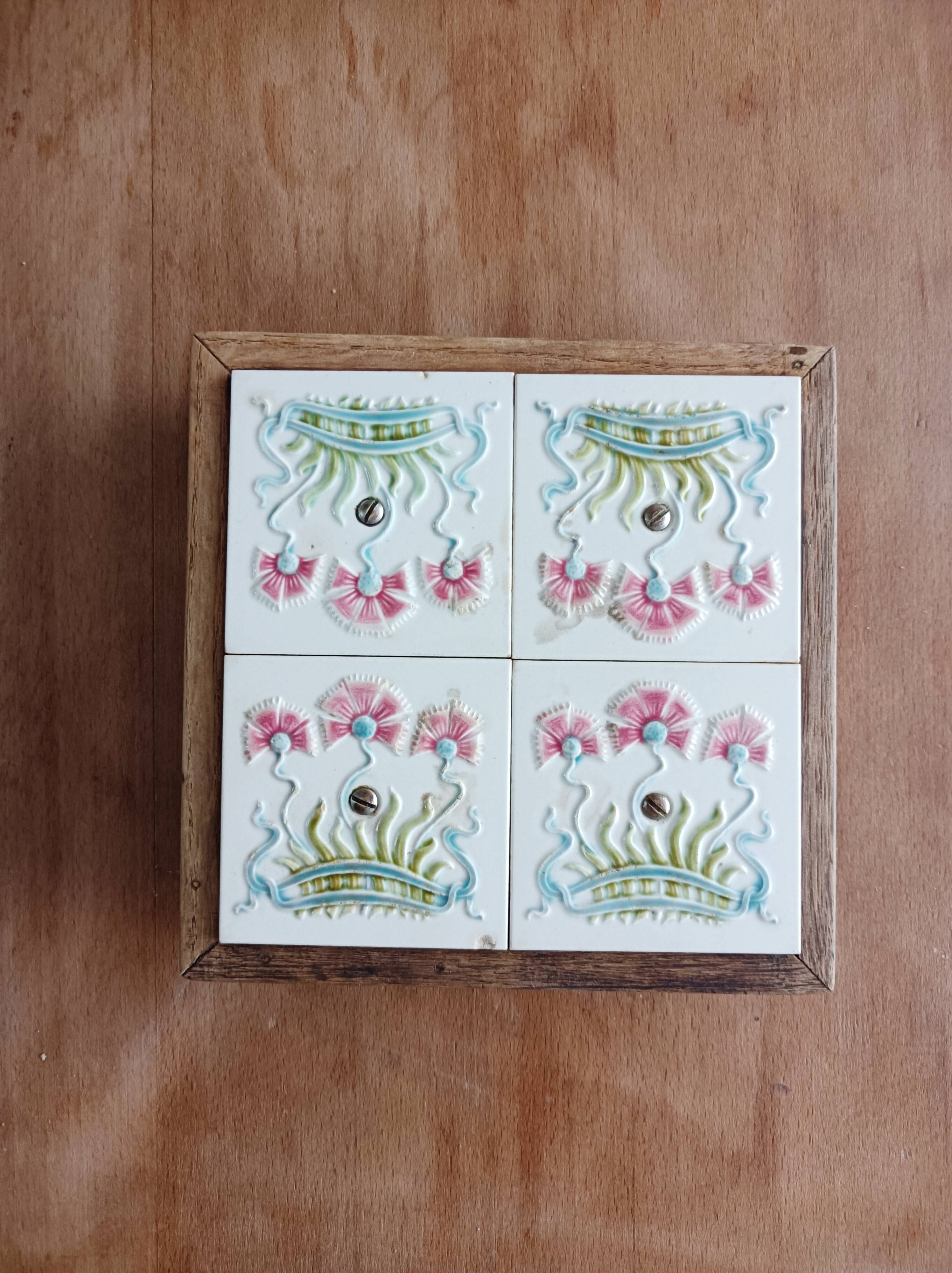 Antique earthenware and wood trivet