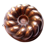 Old copper cake pan, braided crown, kitchen utensil