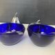A pair of vintage cobalt glass and silver-plated sugar bowls.