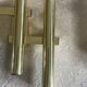 Tubular wall sconces in brass, Italian design from the 70s, attributed to