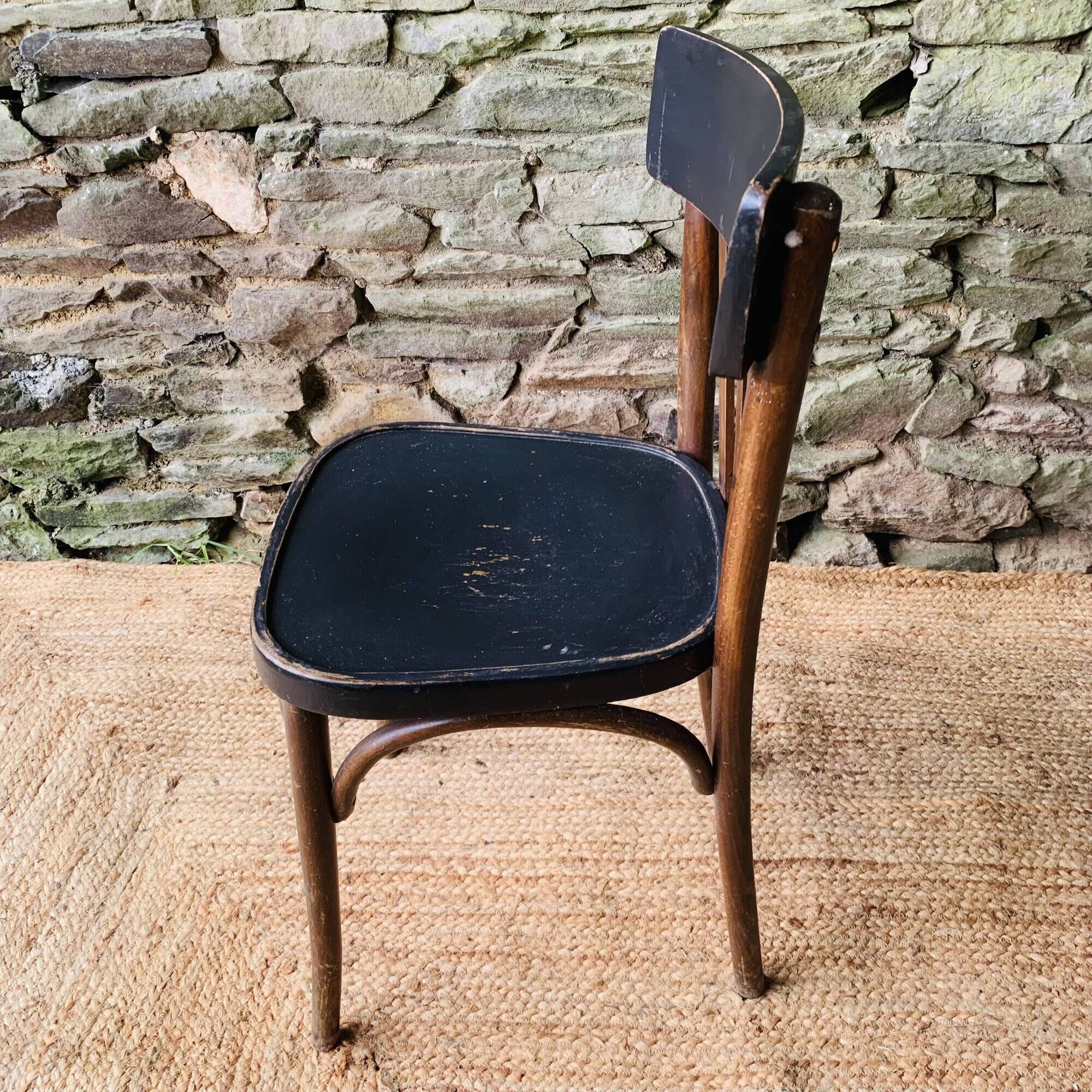 Set of four vintage bentwood bistro chairs.