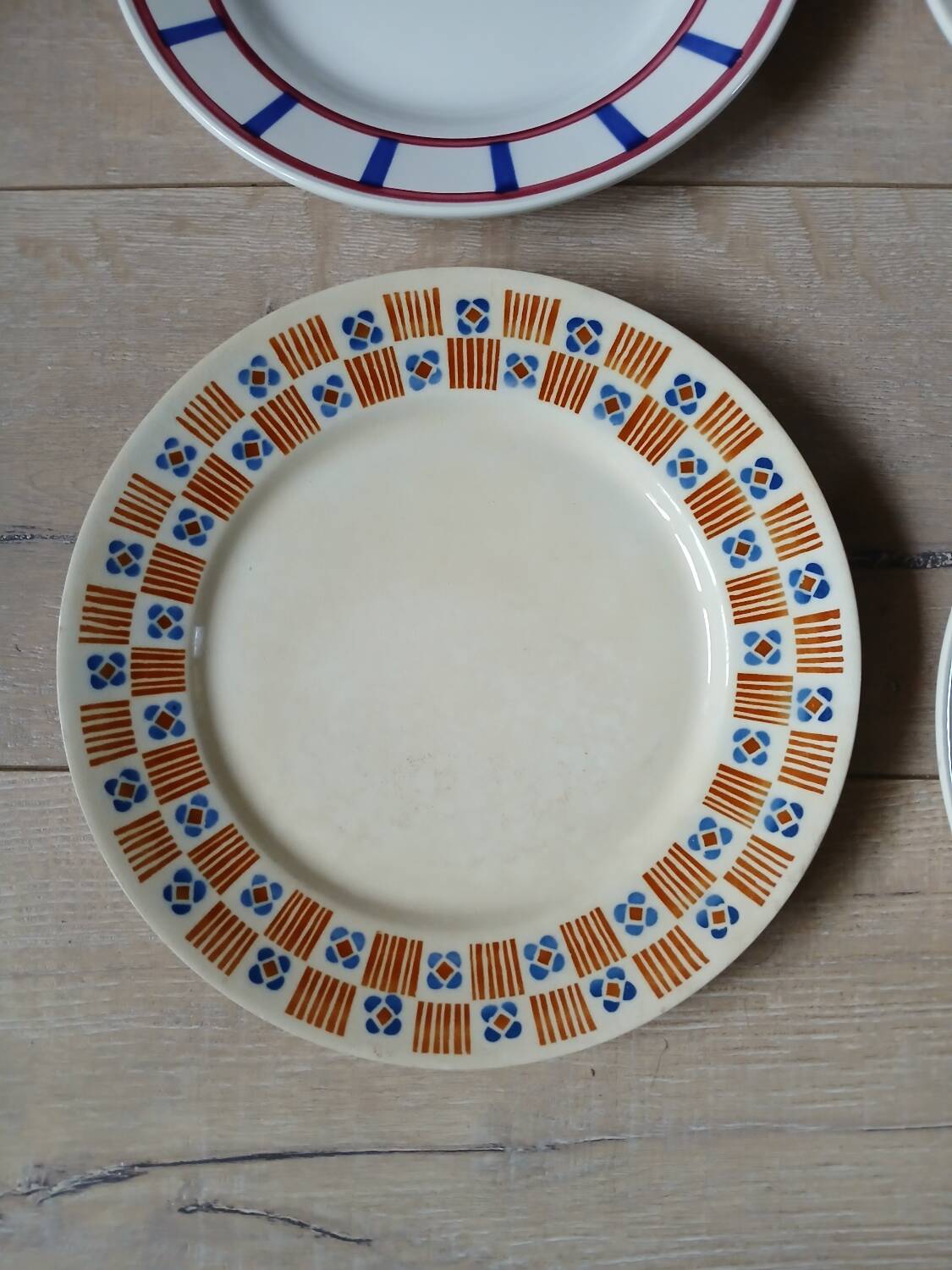 12 mismatched antique dinner plates