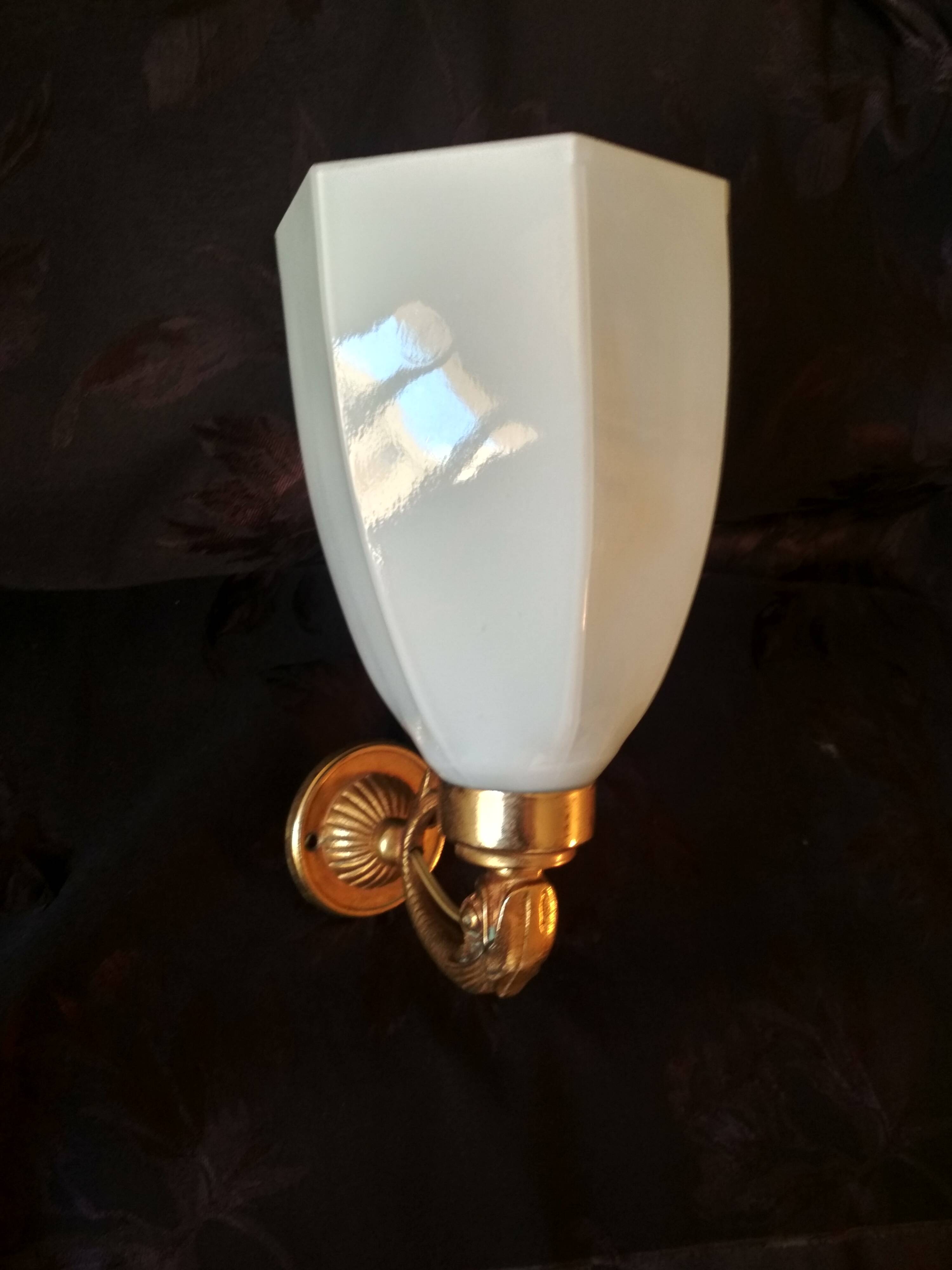Golden brass wall light with glass tulip - dolphin pattern bathroom lamp