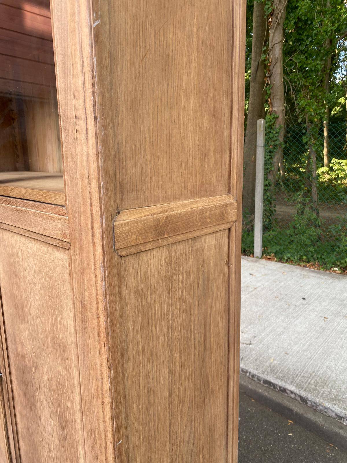 Parisian bonnetière cabinet, stripped display in solid oak from the 1930s.