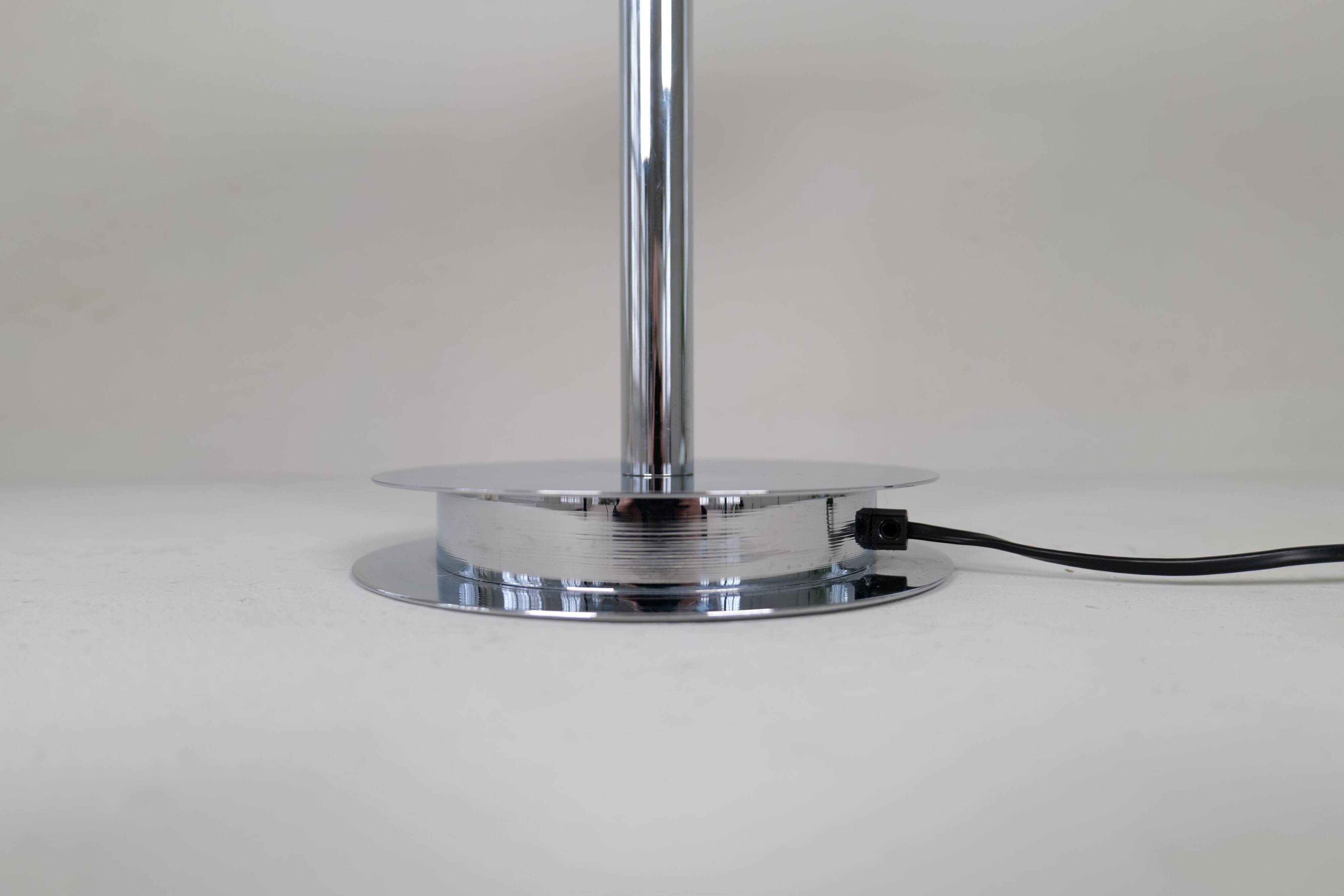 "Tris" glass table lamp by Fontana Arte from the Space Age with a chrome base, Italy, circa 2000.