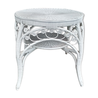 Table ronde en rotin peacock 1960