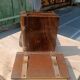 Wooden trompe-l'œil bookends with a book and box