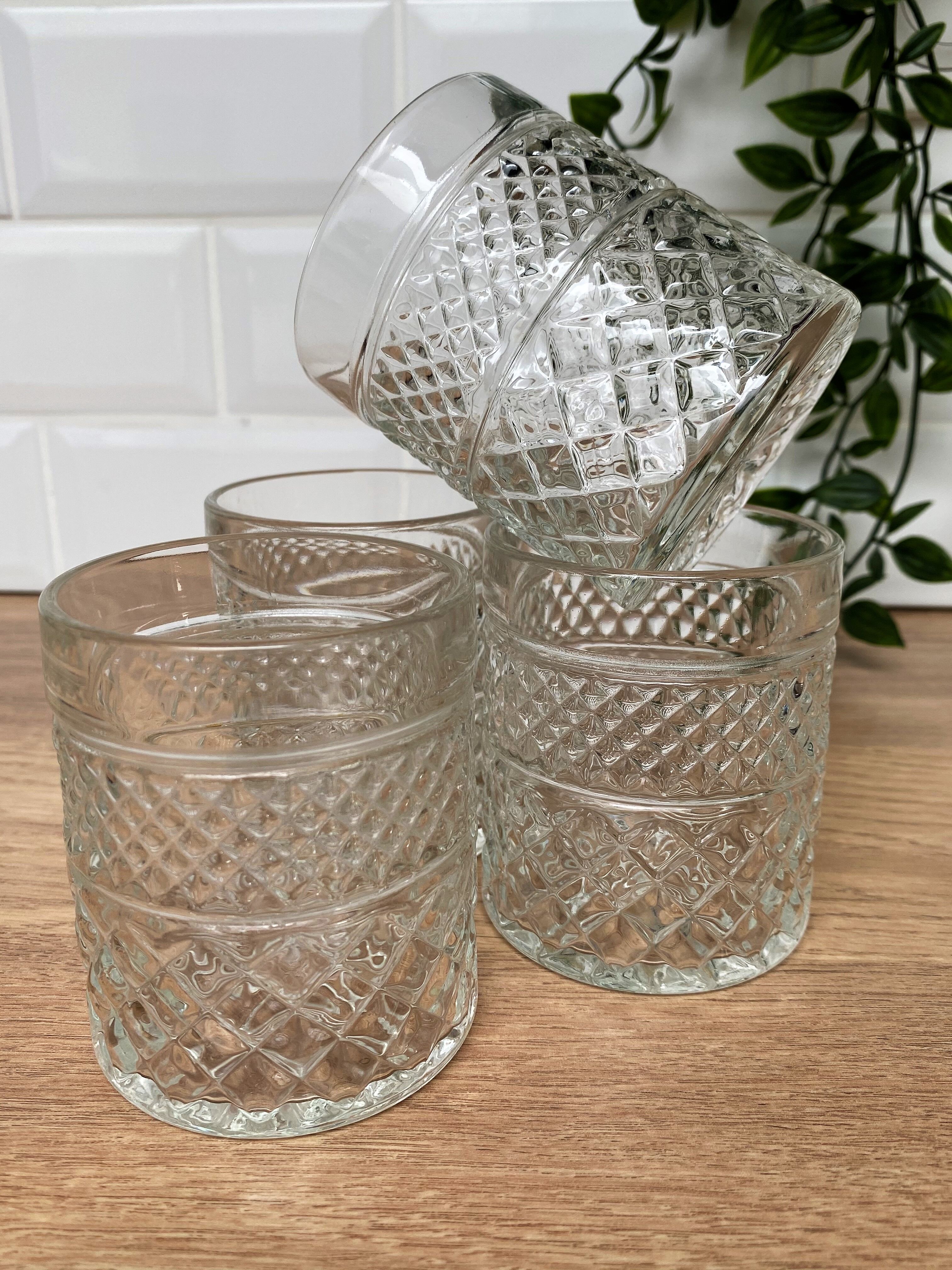 4 glasses with Whisky