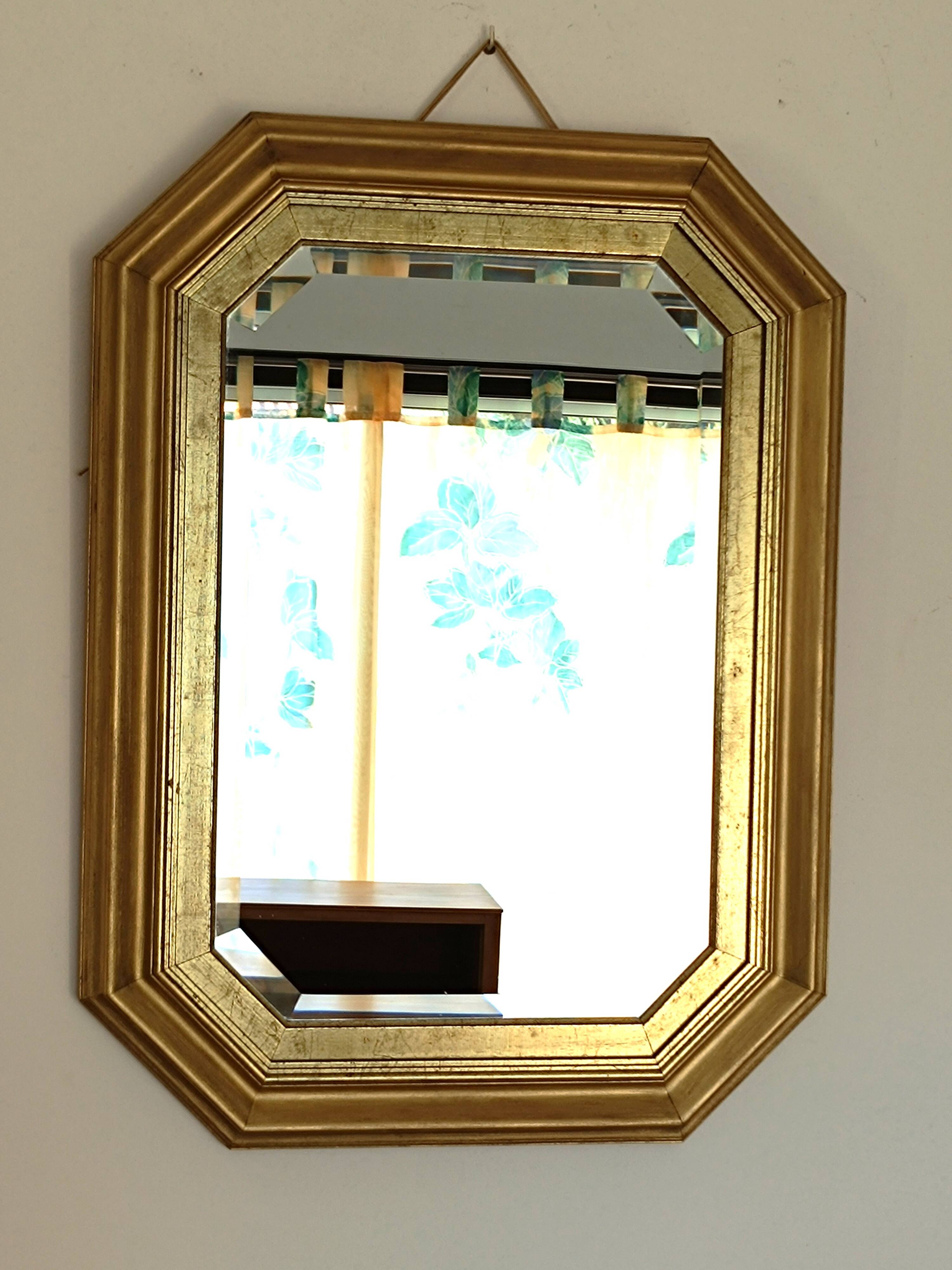 Octagonal gilded wooden mirror