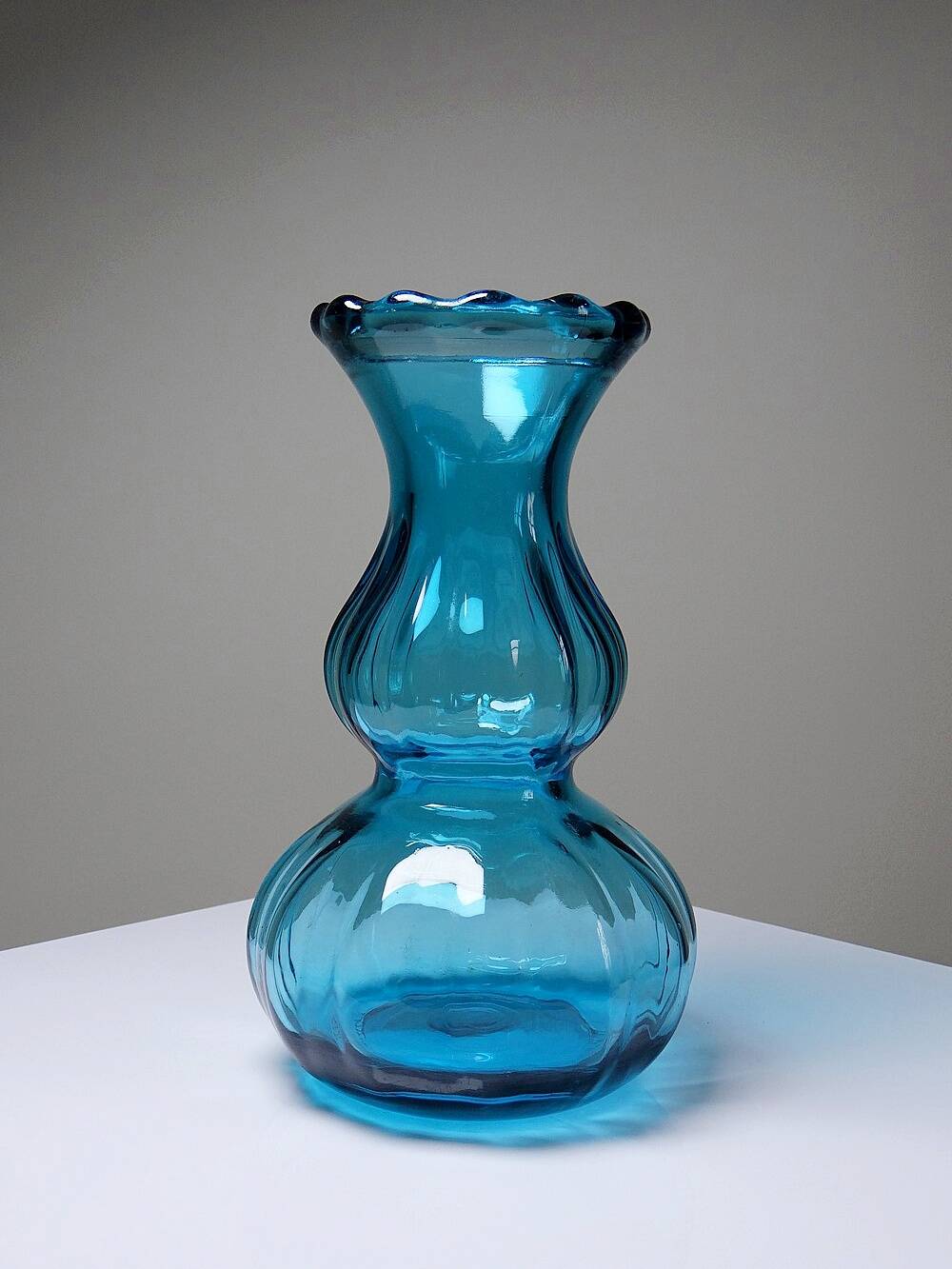 Small vintage turquoise blue glass vase