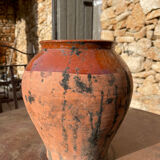 Ancient terracotta pottery jar