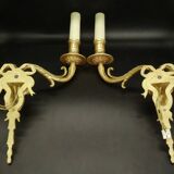 Pair of large Louis XVI style sconces with male faces - bronze