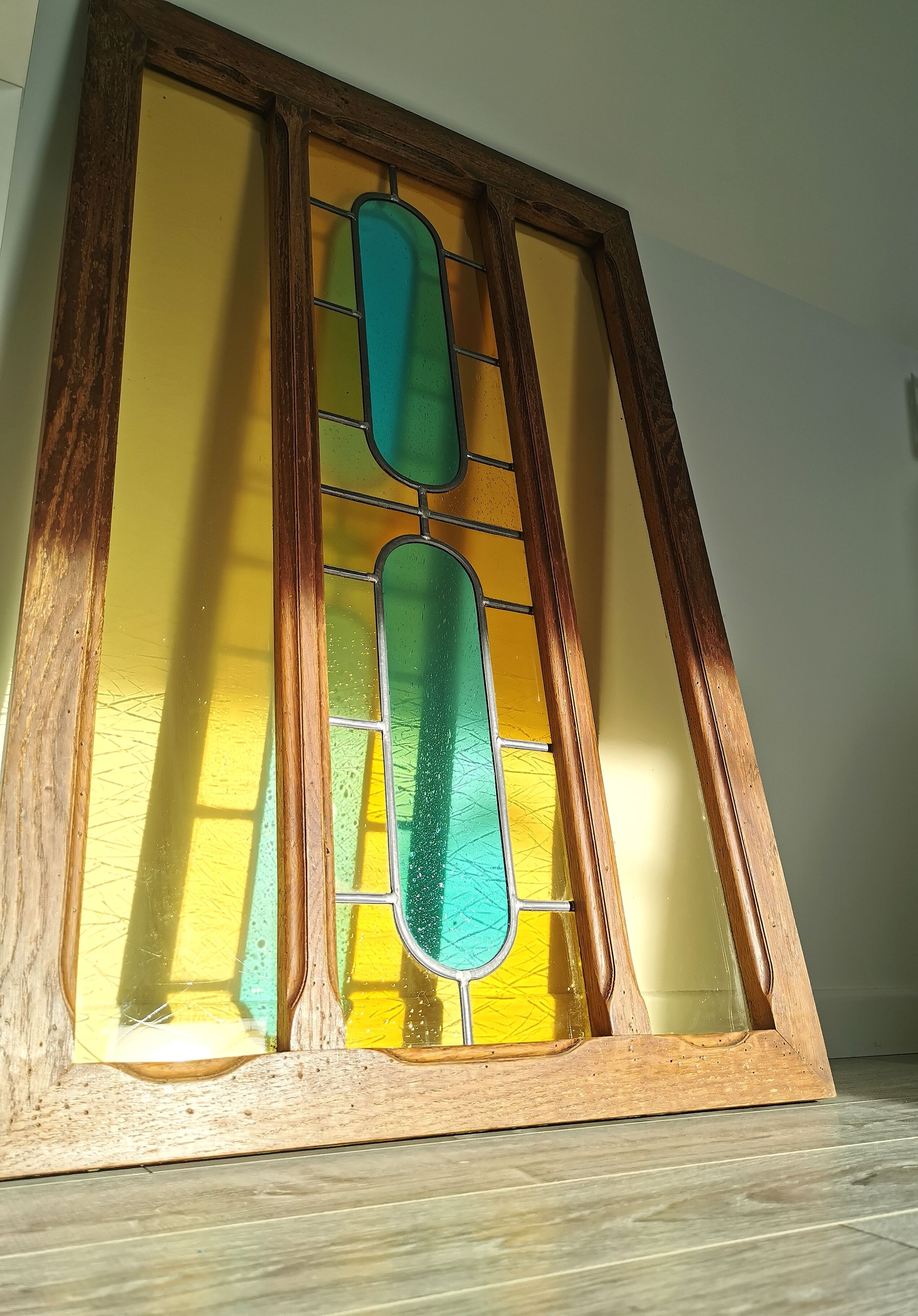 Stained glass window with framing