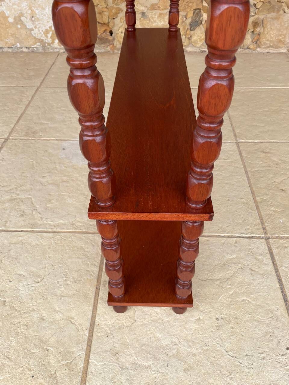 Vintage 5-tier turned wood shelf on legs.