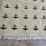 White and black carpet with berber patterns hand-woven in natural wool