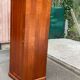 Louis Philippe wardrobe with a solid wood door.