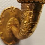 A set of wall lamps in solid brass