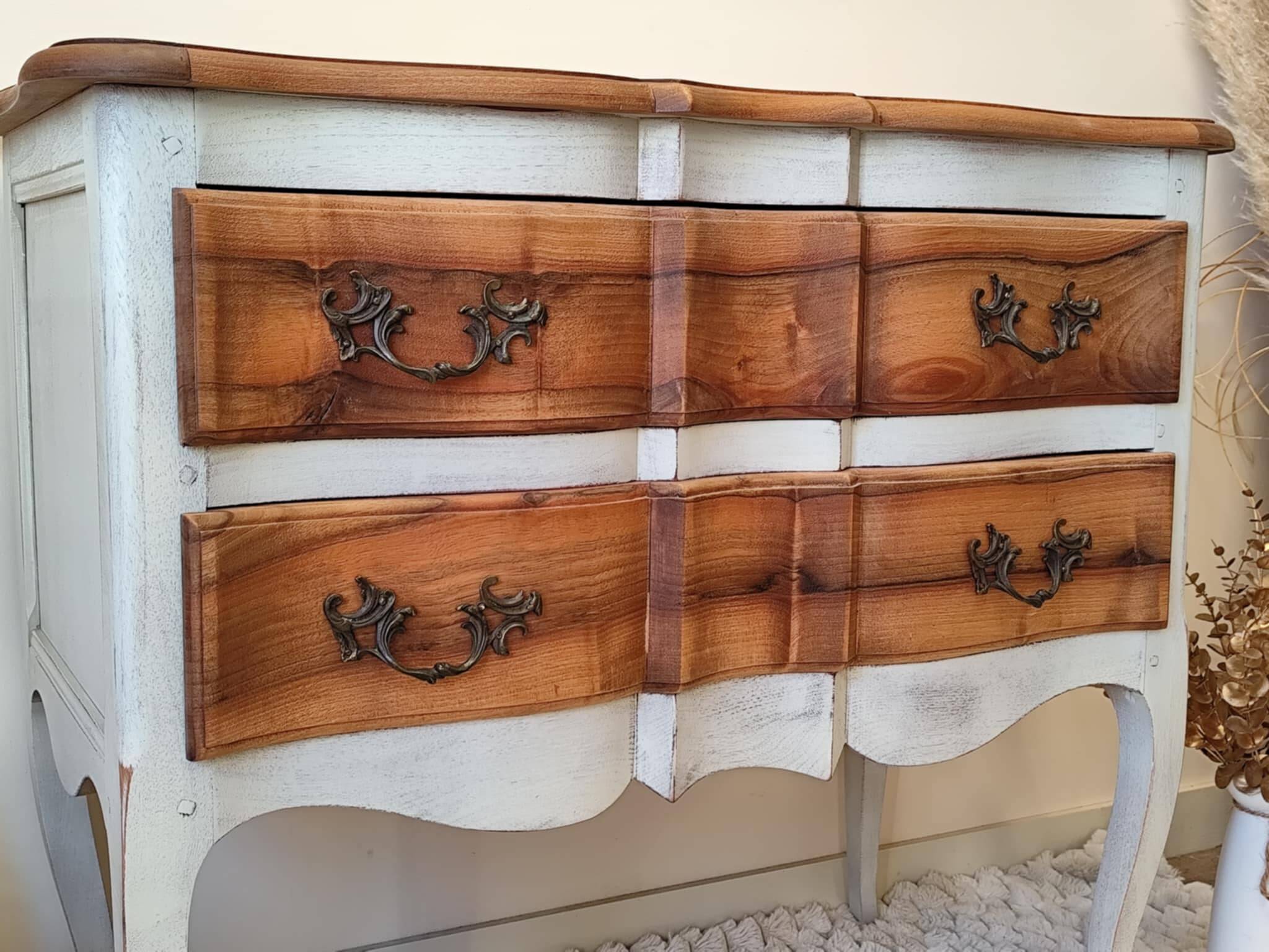 Walnut crossbow chest of drawers